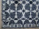Coverlet, Blue & White, Figured & Fancy, True Beiderwand, 2 Panels, No Fringe, Border: 3 sides, Border: Potted Roses, alternating large & small, Centerfield: 4 roses with Buds, 6 point stars, Corner Block:  "1850, SENA EDWARDS, DARIEN, GENESEE CO NY", Eagle with Shield, Branches & Arrows.